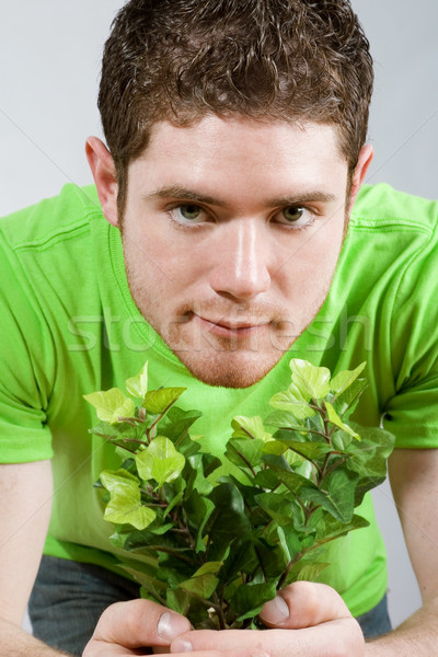 Man holding small plant Stock photo © iodrakon
