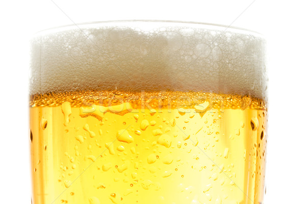 Cerveza pinta oro vidrio blanco Foto stock © iodrakon