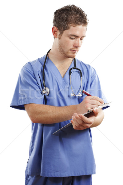 Doctor de sexo masculino stock imagen escrito paciente tabla Foto stock © iodrakon