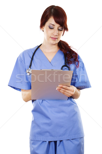 Vrouwelijke gezondheidszorg werknemer voorraad afbeelding schrijven Stockfoto © iodrakon