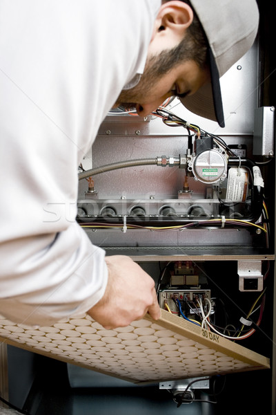 Technicus voorraad afbeelding filteren oven industriële Stockfoto © iodrakon