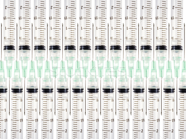 Syringes background Stock photo © iodrakon