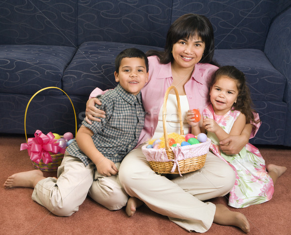 Familia Pascua sesión piso sonriendo Foto stock © iofoto