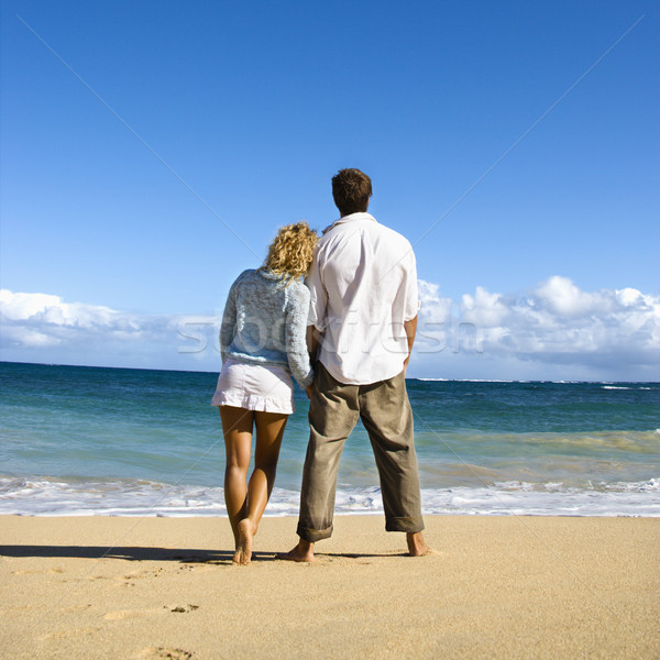 Fechar casal atraente em pé olhando Foto stock © iofoto