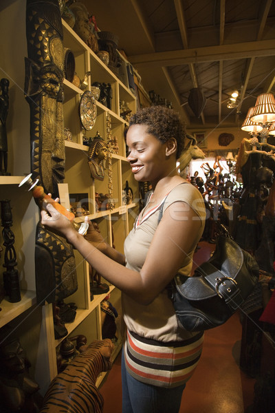 Young African American Woman Browsing in a Store Stock photo © iofoto