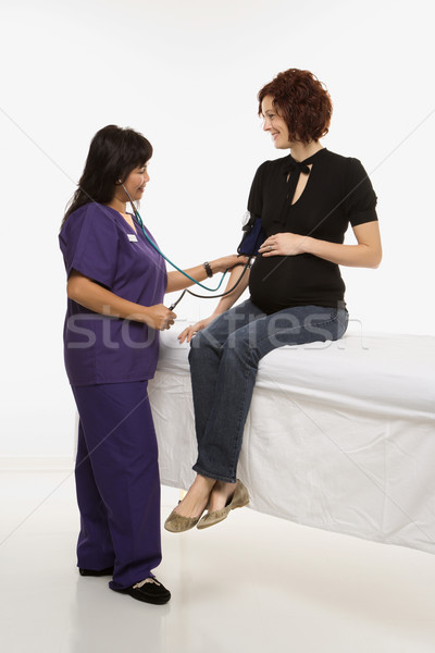 Terhes nő vizsga terhes kaukázusi nő életbevágó Stock fotó © iofoto