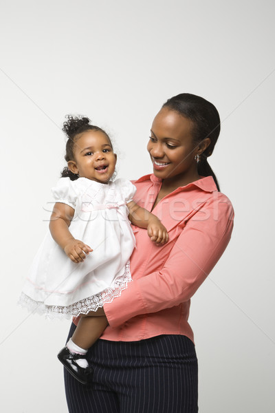 Stock fotó: Nő · tart · csecsemő · lány · afroamerikai · áll