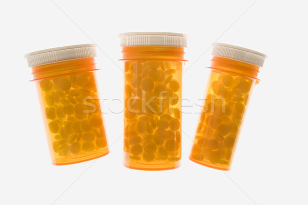 Foto stock: Três · amarelo · plástico · medicina · garrafas · isolado