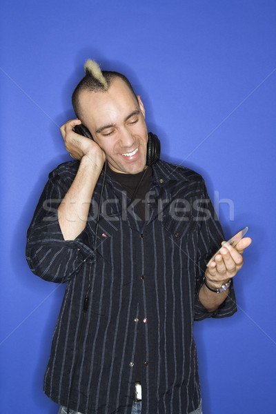 Man listening to music. Stock photo © iofoto