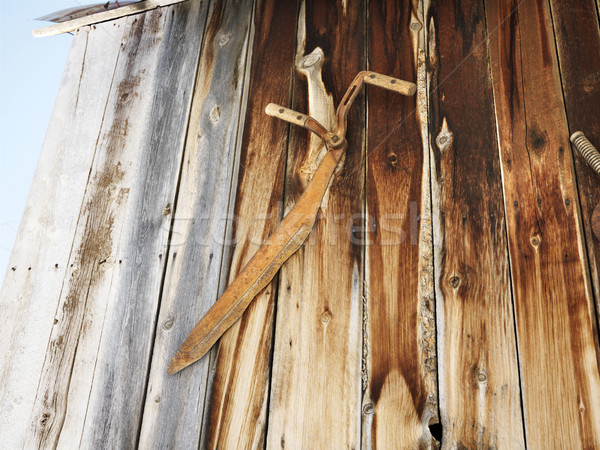 Rusted tool against siding Stock photo © iofoto