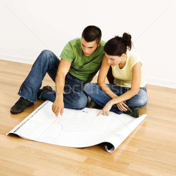 Couple lecture blueprints séduisant regarder [[stock_photo]] © iofoto