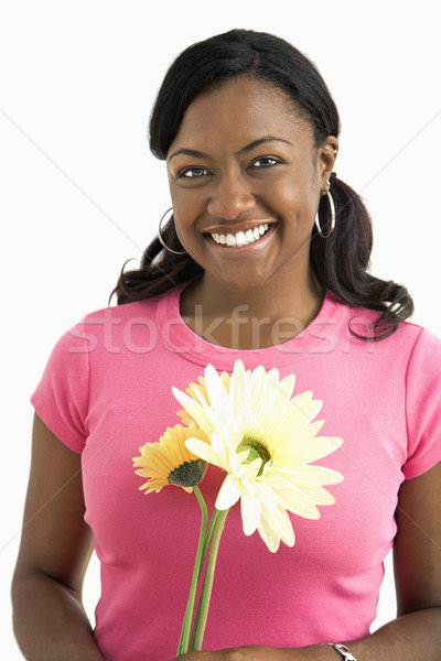 Hübsche Frau Blumen Porträt lächelnd weiblichen Stock foto © iofoto