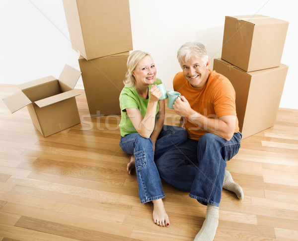 Stock photo: Couple with moving boxes.