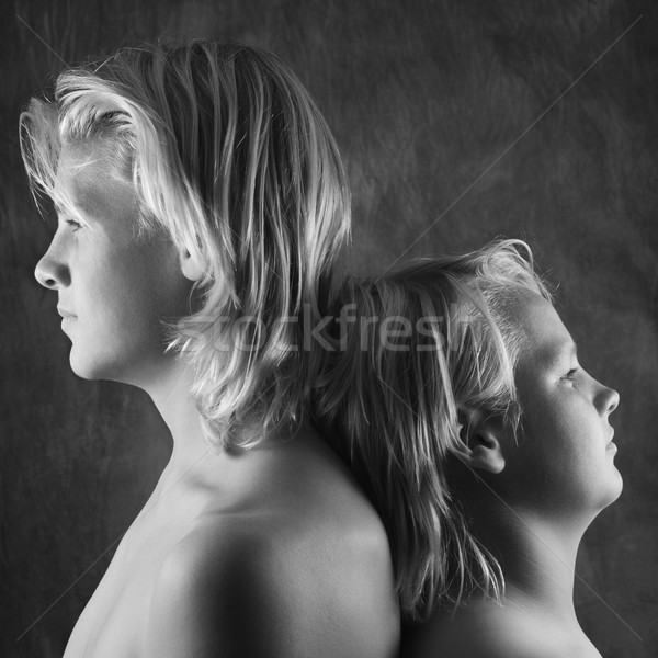 Two brothers back-to-back Stock photo © iofoto