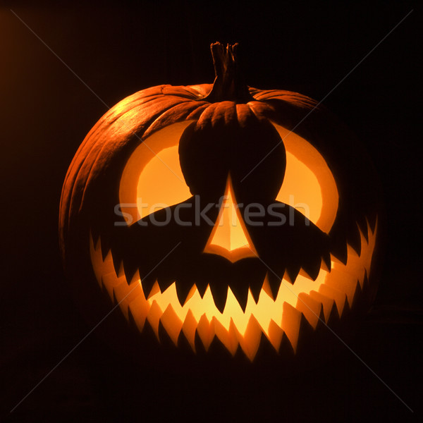 Glowing jack-o'-lantern. Stock photo © iofoto