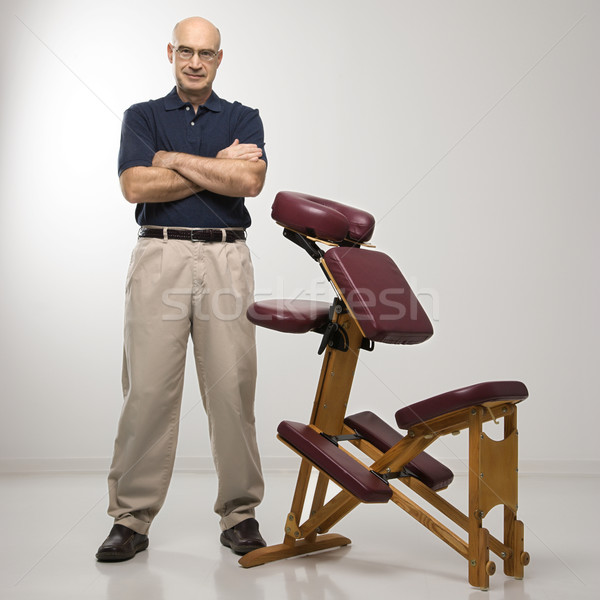 Massage therapist and chair. Stock photo © iofoto