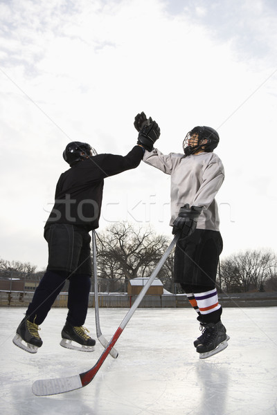 Stock photo: Congratulating teammate.