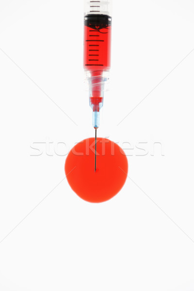 Needle with red liquid. Stock photo © iofoto