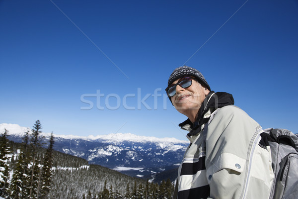 [[stock_photo]]: Homme · skieur · montagnes · supérieurs · posant