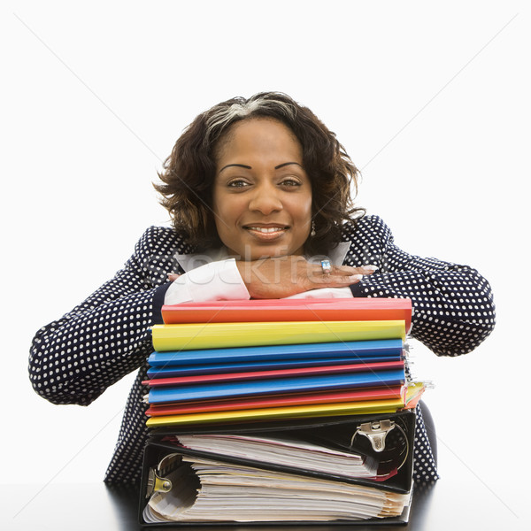 Happy hardworking businesswoman. Stock photo © iofoto