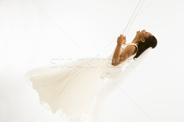 Angelic bride on swing. Stock photo © iofoto