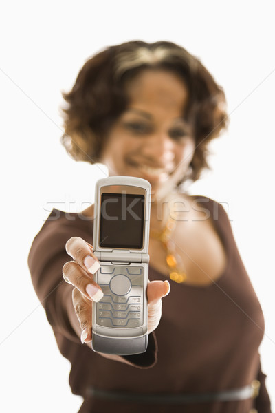 Stock photo: Woman holding cellphone.