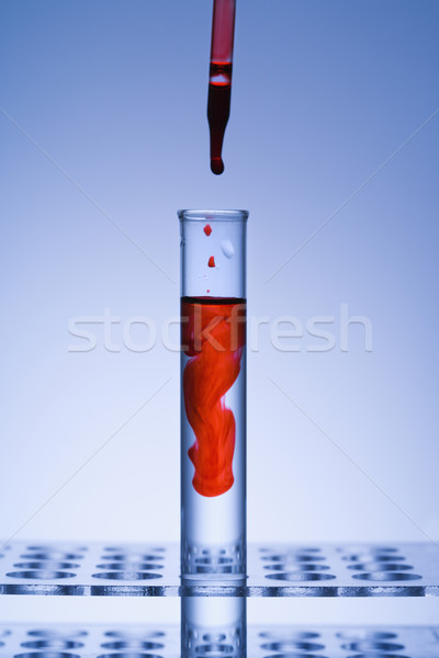 пробирку глаза пипетка красный жидкость стекла Сток-фото © iofoto