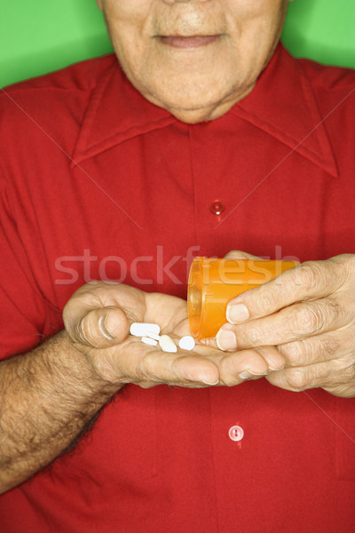 Man taking medication. Stock photo © iofoto