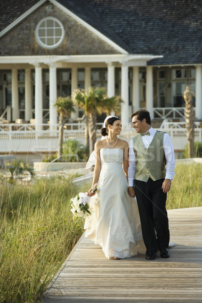 Bride and groom walking. Stock photo © iofoto