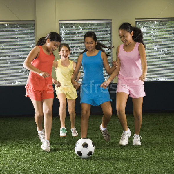 Ragazze giocare calcio quattro ridere Foto d'archivio © iofoto