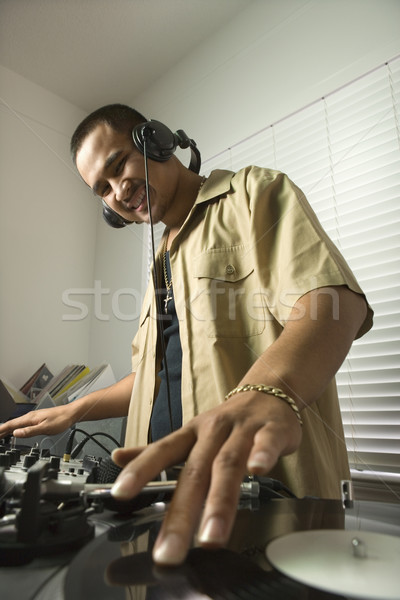 Male spinning records. Stock photo © iofoto