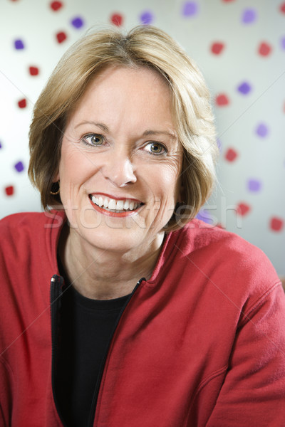 Portrait of smiling woman. Stock photo © iofoto