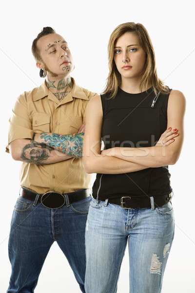 Teen girl and tattooed man. Stock photo © iofoto