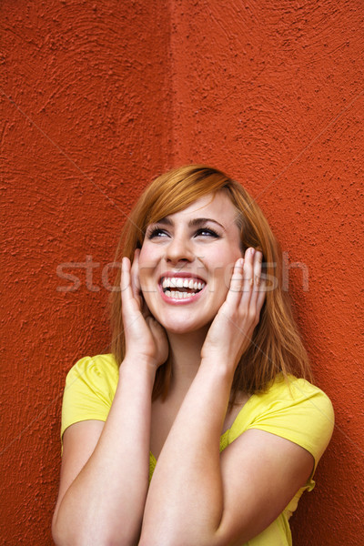 Stock photo: Woman covering ears