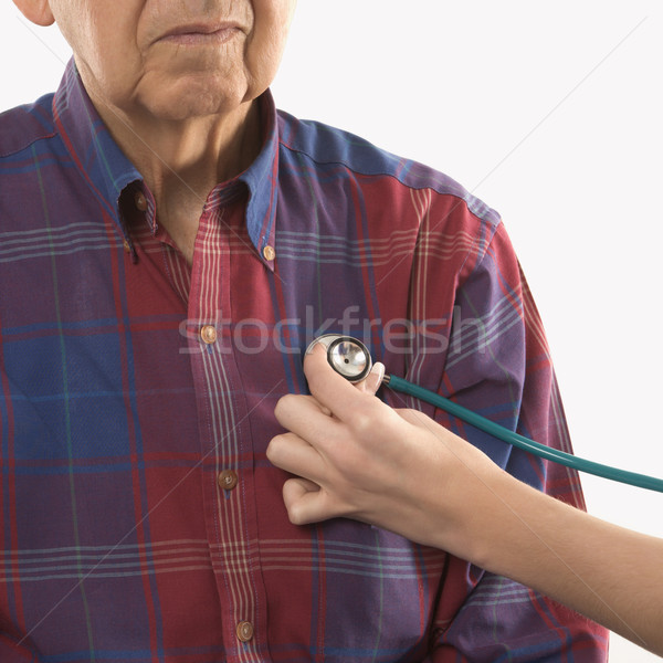 Checking patient's heart. Stock photo © iofoto