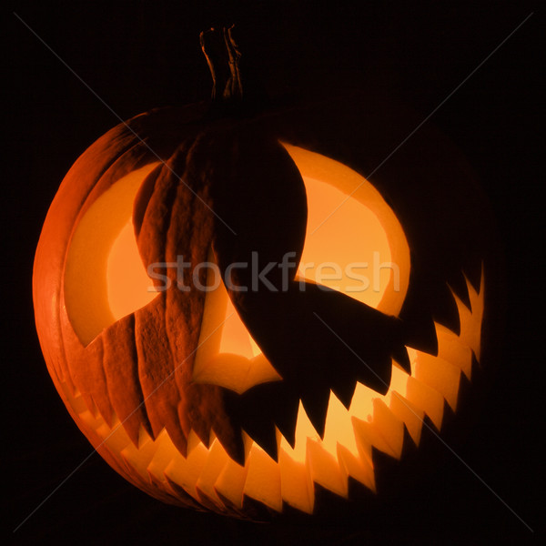 Carved pumpkin. Stock photo © iofoto
