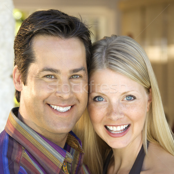 Caucasian couple smiling. Stock photo © iofoto