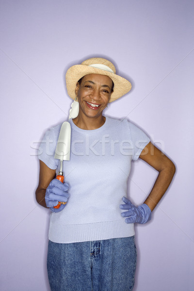 Woman with hand shovel. Stock photo © iofoto