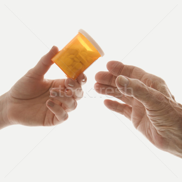 Hands with medicine. Stock photo © iofoto