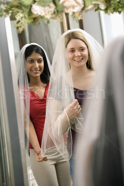 Barátok indiai nő kaukázusi néz tükör Stock fotó © iofoto