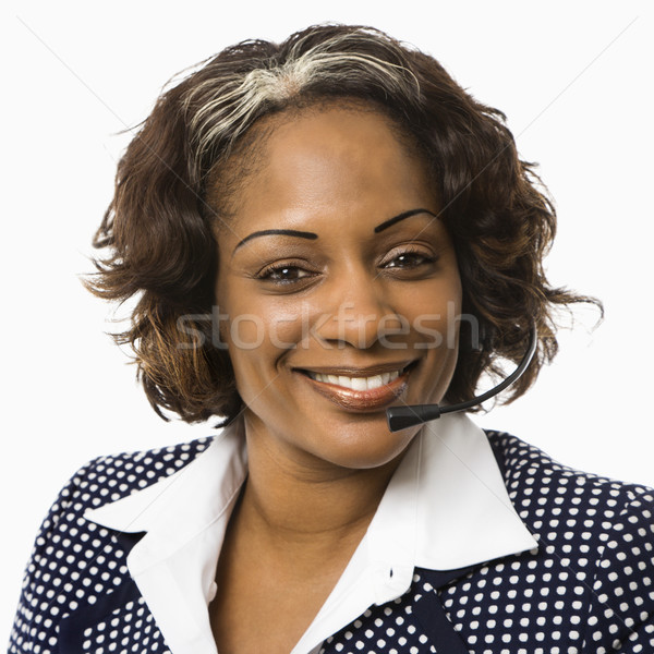 Femme d'affaires casque tête épaule souriant parler [[stock_photo]] © iofoto