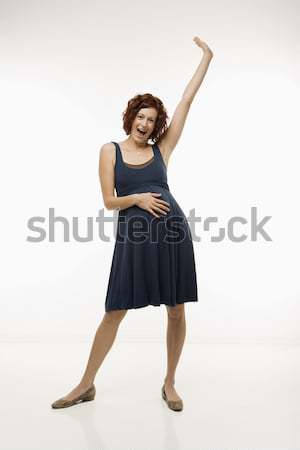 Happy pregnant woman. Stock photo © iofoto