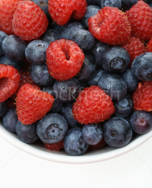 Blueberries and raspberries. Stock photo © iofoto