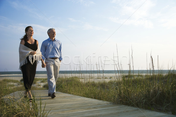 Stock photo: Couple holding hands.