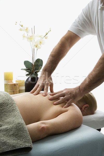 Man massaging woman. Stock photo © iofoto