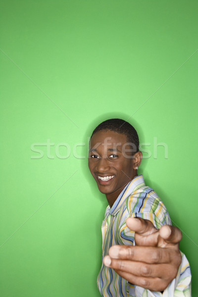 Smiling teen boy. Stock photo © iofoto