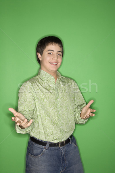 Stock photo: Teenage boy gesturing.