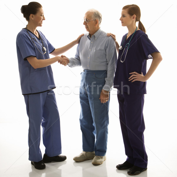 Doctors and patient. Stock photo © iofoto