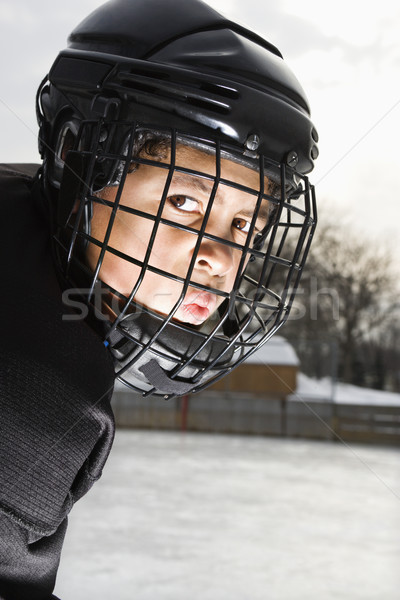 Zdjęcia stock: Hokej · gracz · chłopca · uniform · klatki · kask