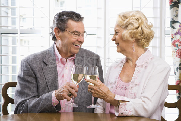 Mature couple toasting. Stock photo © iofoto